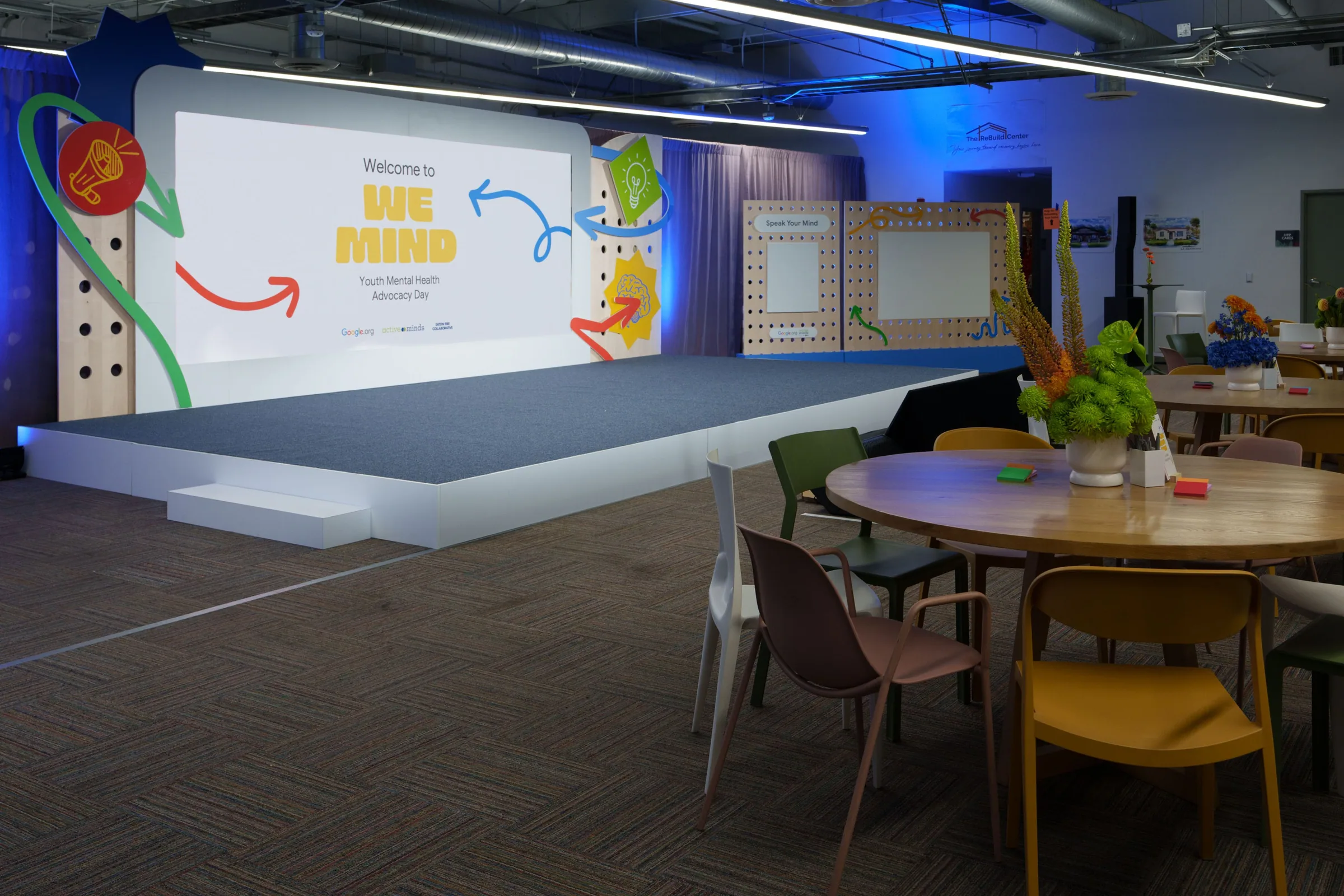 The empty stage with its illustrated backdrop