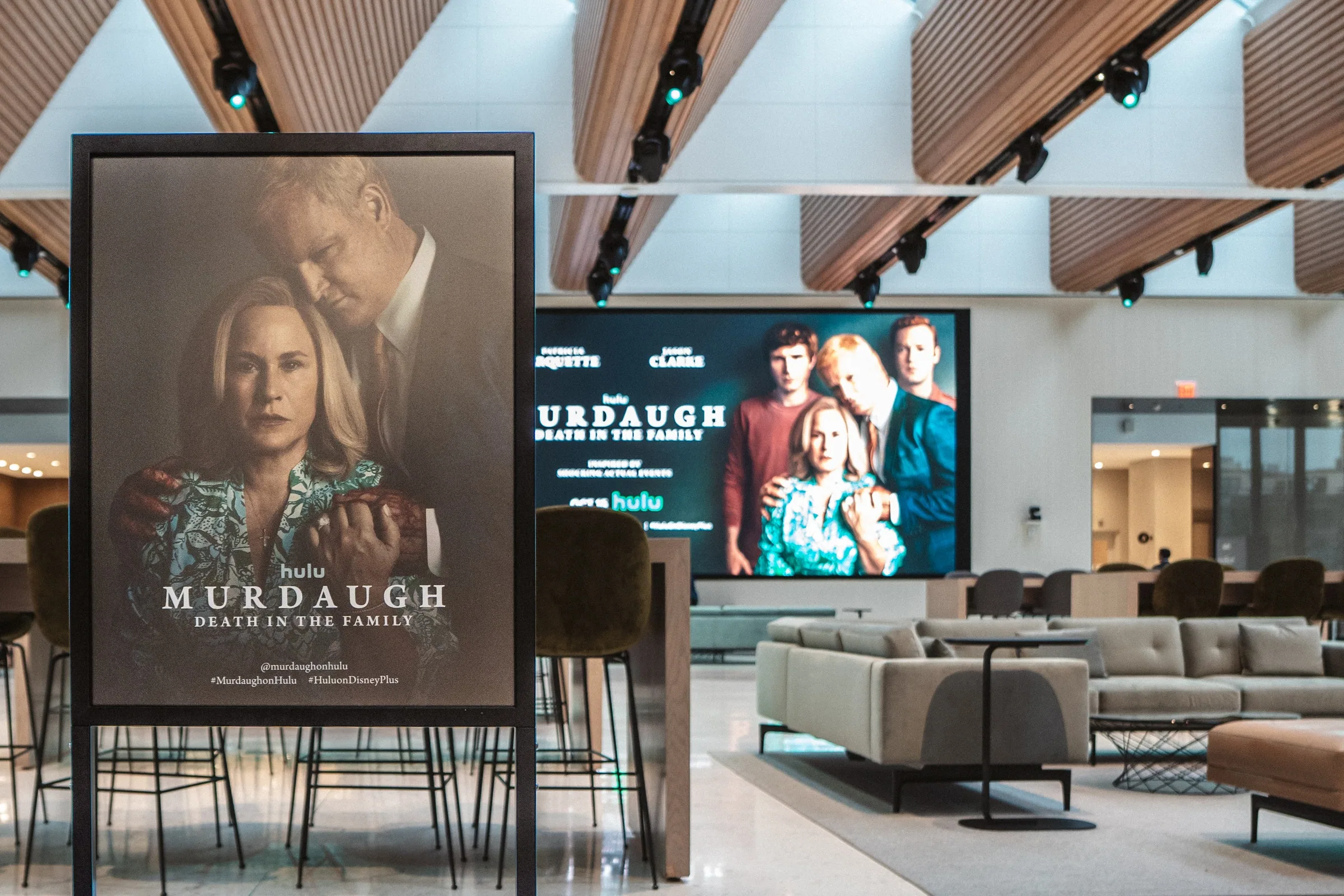 Framed Murdaugh posters and a big screen in the lobby